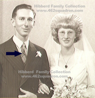 Former F/Sgt M.J.Hibberd and his wife on their Wedding Day, 5 Nov 1949, with Caterpillar Club pin visible on Groom's tie. (462 Squadron)