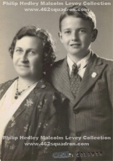 Studio portrait of young Philip Hedley Malcolm Levey with his mother Ruth Woolnough Levey.