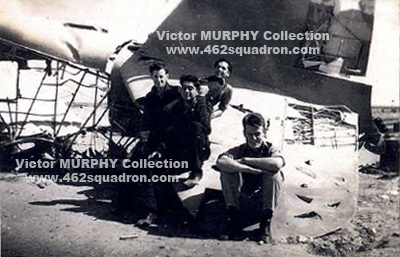 462 Squadron, El Adem – Bill McKay, Vic Murphy, Pat Tall and Charlie Hall beside a crashed JU52.
