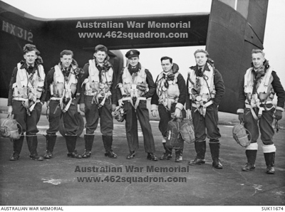 MacDermott crew beside Halifax HX312, HD-K, January 1944; L-R Trevor Evans, N McA Brown, F Cook, Bernard John MacDermott, William Stuart Shoemaker, William Victor Dodd, Leslie Thomas Sanders.