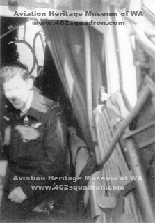 Navigator Keith Currie 436316 RAAF, 462 Squadron, Foulsham, 1945; in a Halifax beside the Navigator's station.