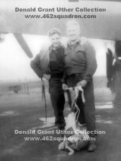Bomb Aimer Geordie (or Jordie?) Cunningham and Pilot Don Uther with parachute, under aircraft wing; location not known, UK 1944 or 1945; posted to 462 Squadron, Driffield and Foulsham.
